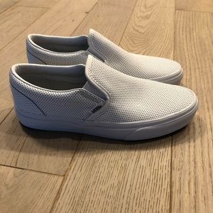 Vans white slip ons